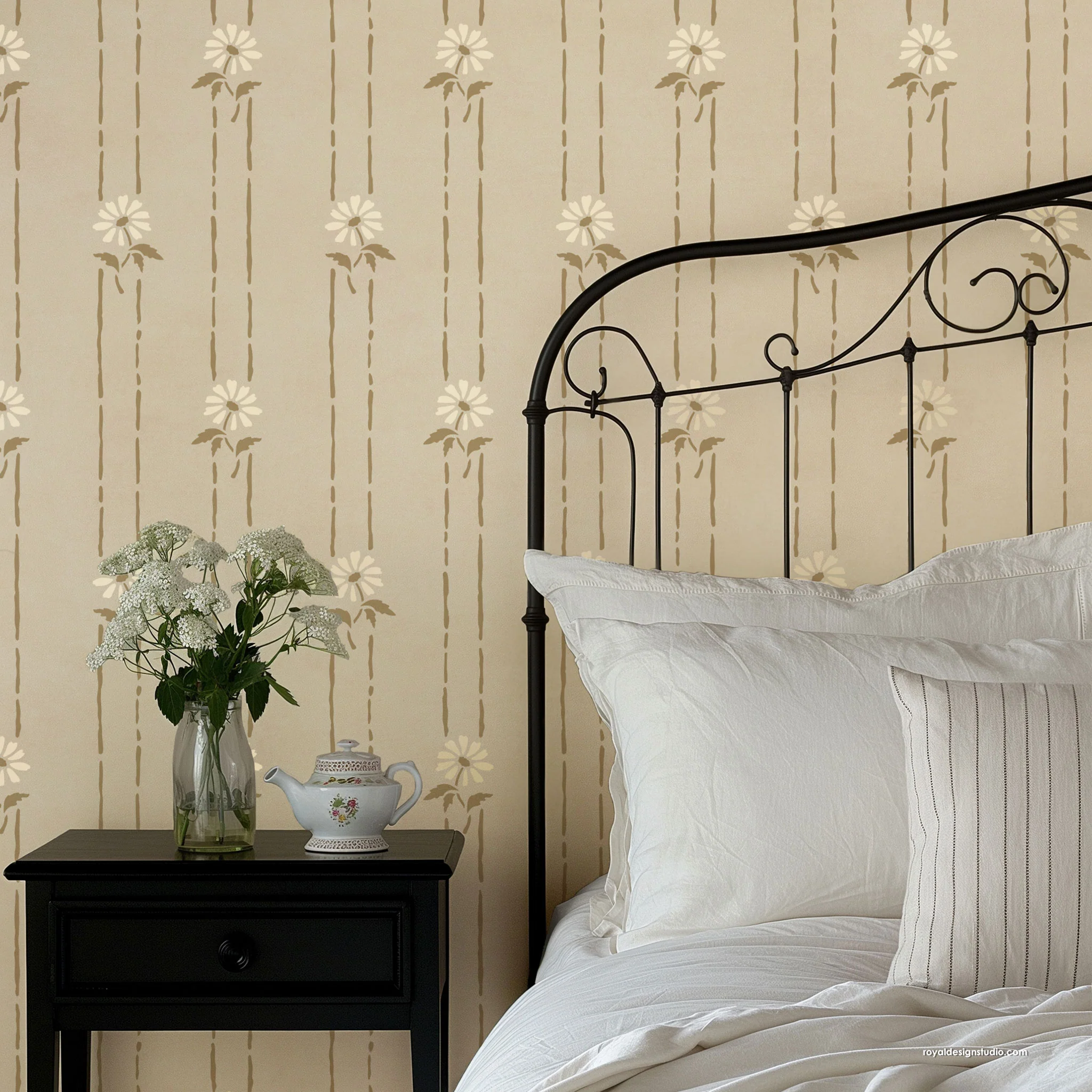 Floral Stripe stencil in cottage farmhouse style with black antique iron bed