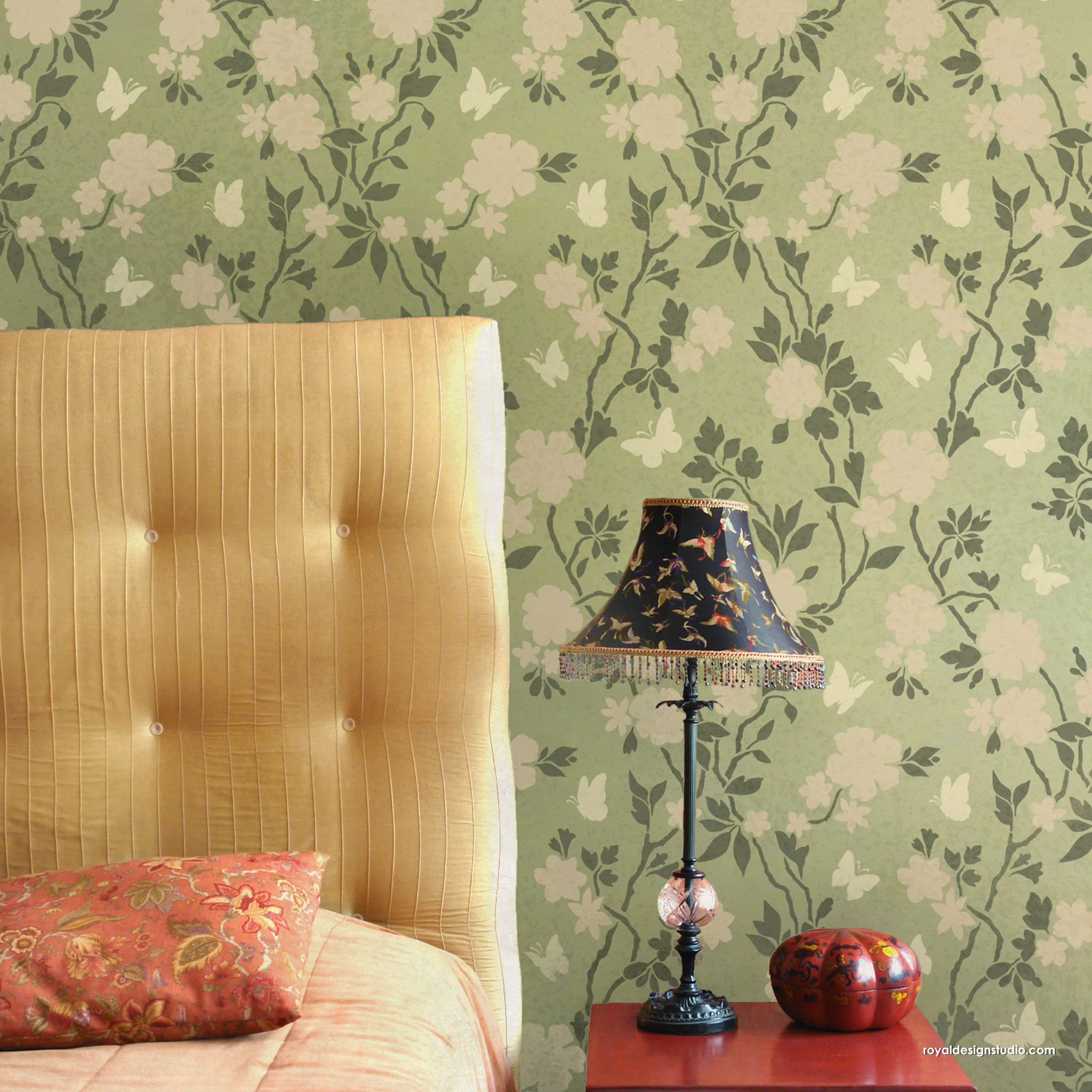 Bedroom wall with floral chinoiserie wallpaper pattern with hand painted touches
