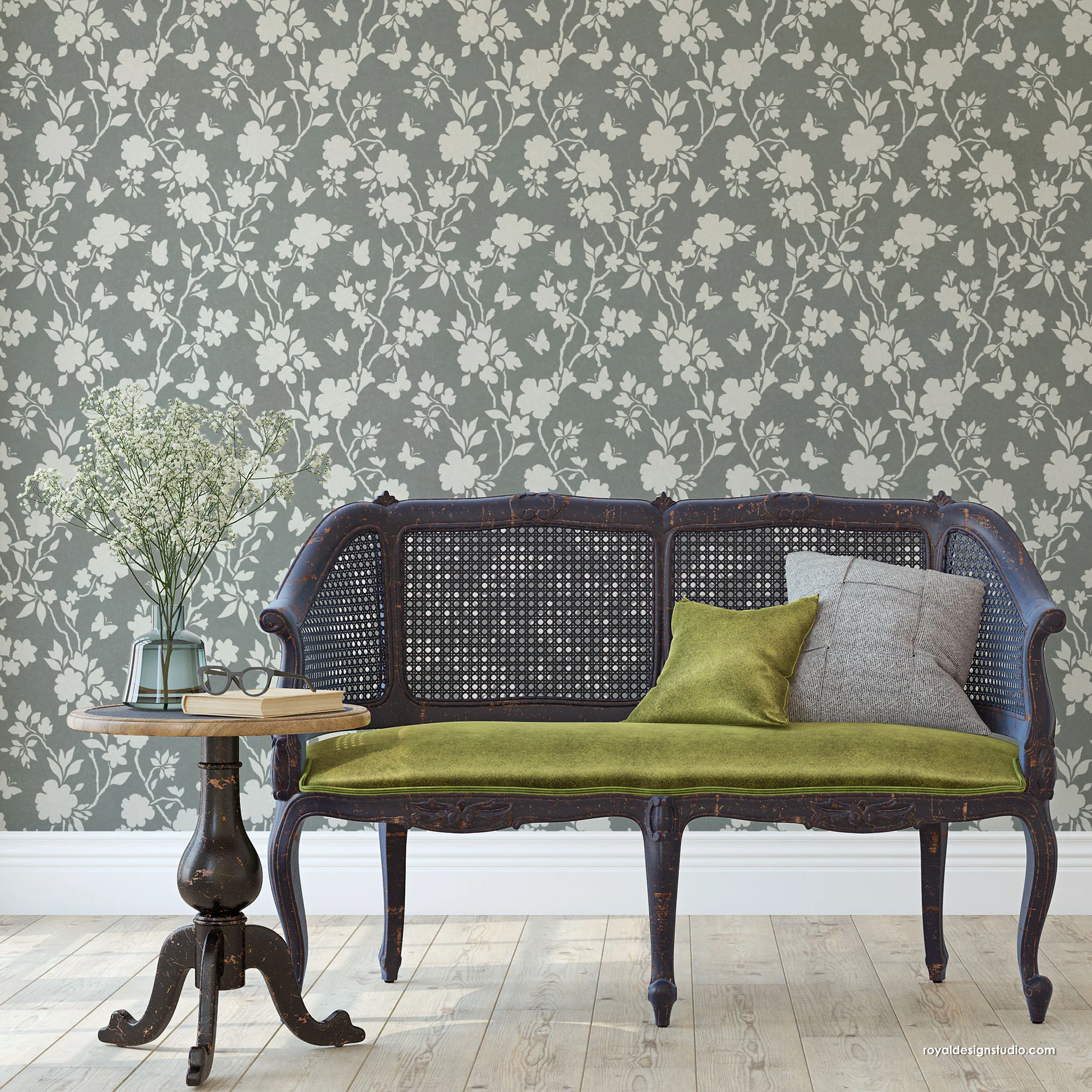 Vintage-style bench against a floral  chinoiserie hand painted wallpaper pattern wall.